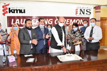 04.Minister of Health Taimur Salim Jhagra along with VC KMU Prof Dr Zia ul Haq and others cutting cake during PhD Launching Ceremony at KMU1604146039.JPG